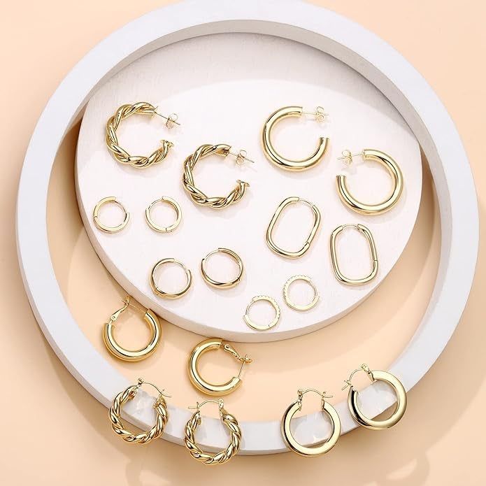 An assortment of gold hoop earrings, providing a range of sizes and styles for every occasion.