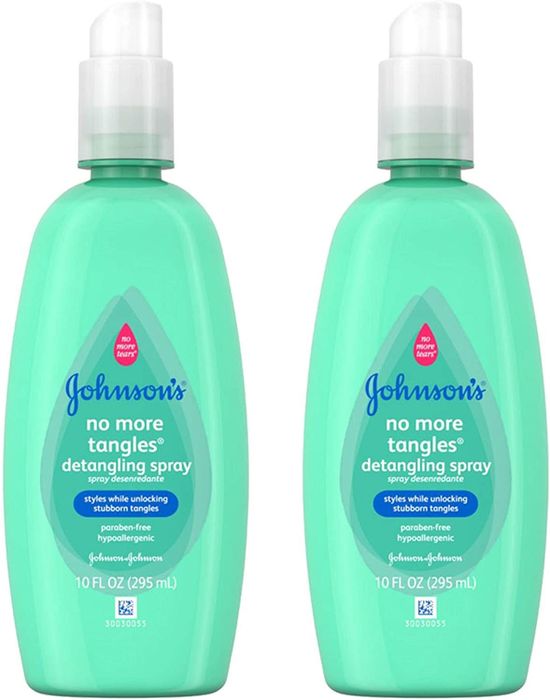 The detangling spray inside a green bottle