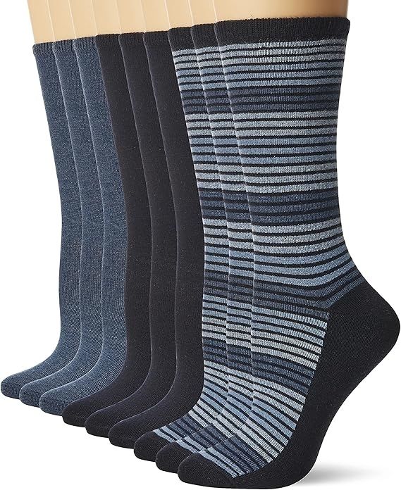 A row of socks displayed, featuring both solid colors and striped patterns.