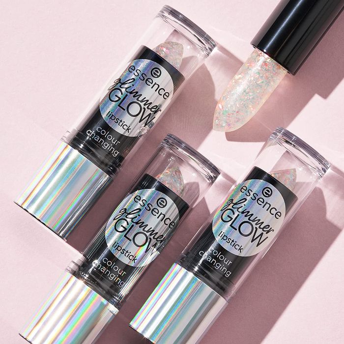 The glittery, clear lipstick resting in its case.