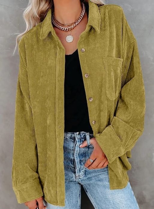 A model wearing the top in green.