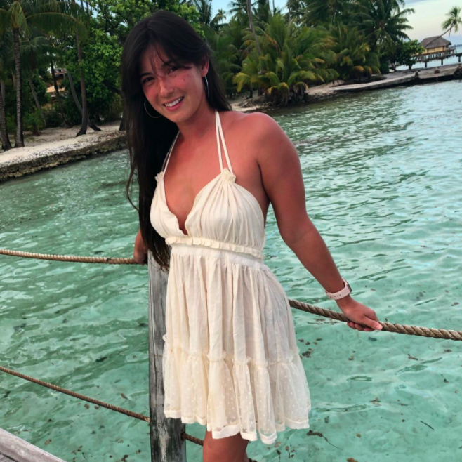 A customer review photo showing the halter dress in beige.
