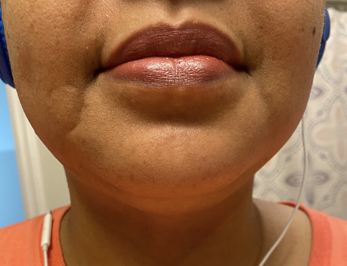 Another reviewer demonstrates the lipstick worn for a polished, complete look.