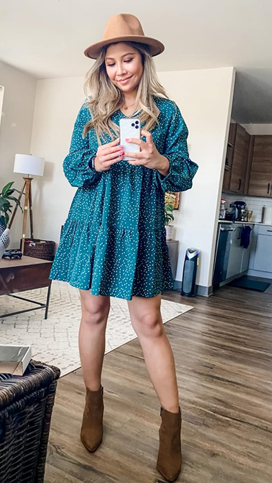 Another reviewer showing off the dress in green with polka dots.