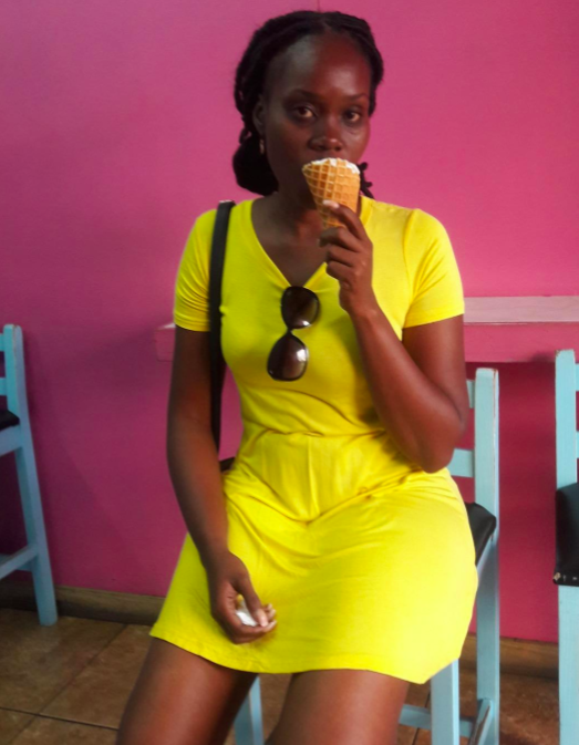 A customer review photo of the T-shirt dress in yellow.