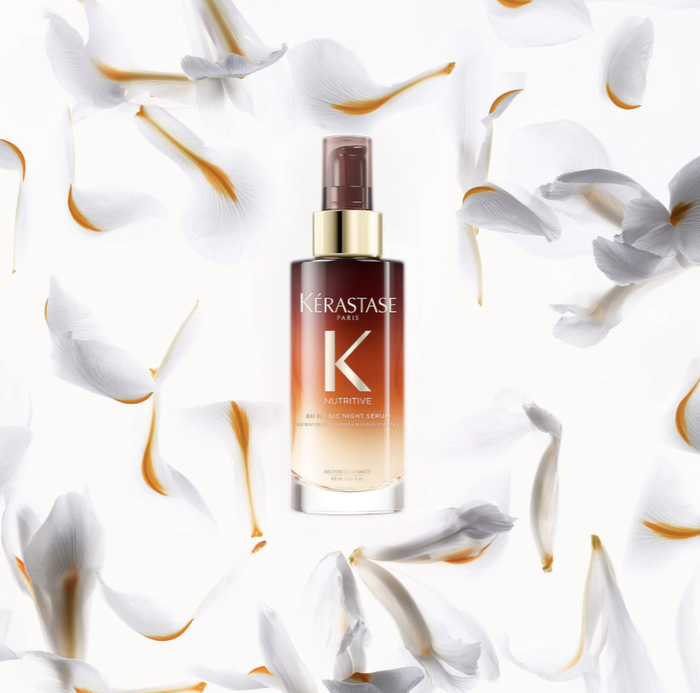 The ombre brown and clear bottle of the hair night serum.