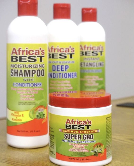 A jar of hair conditioner paired with bottles of shampoo and liquid conditioner