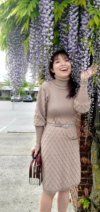 A reviewer rocking the dress in a rich camel hue.