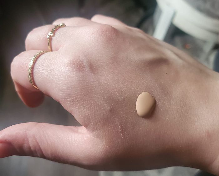 reviewer photo of the serum foundation applied on the back of their hand