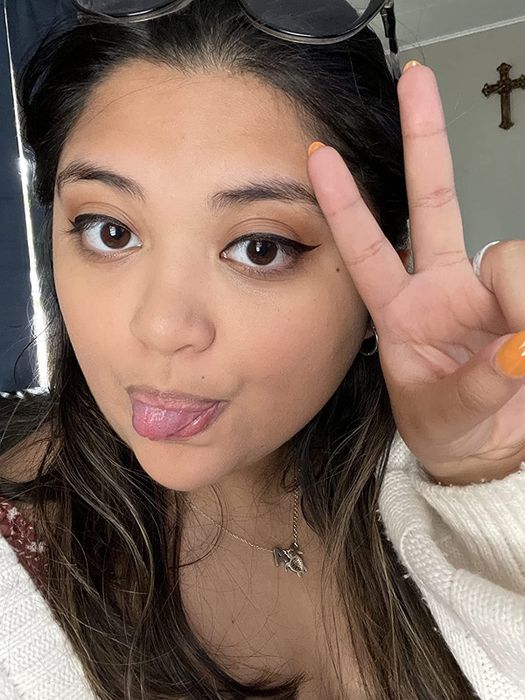 same reviewer's selfie wearing the tinted moisturizer