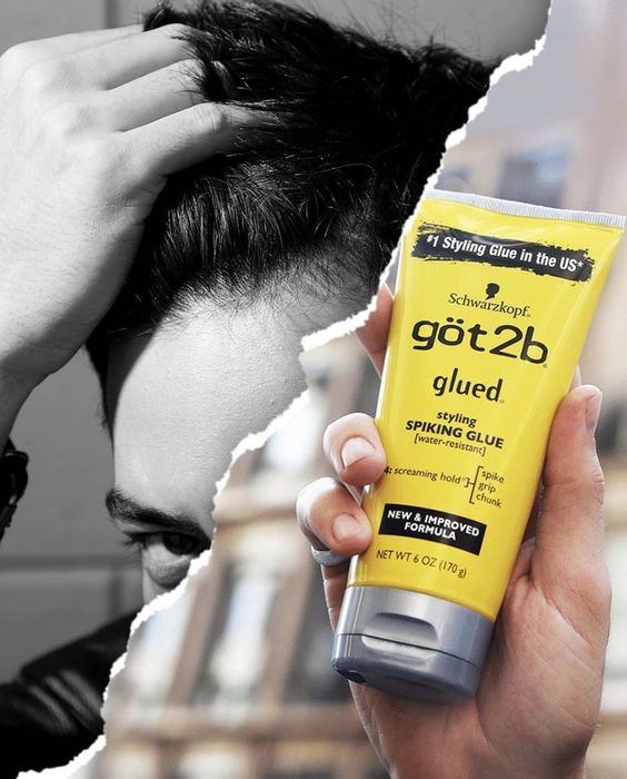 A tube of styling glue with a man styling his hair