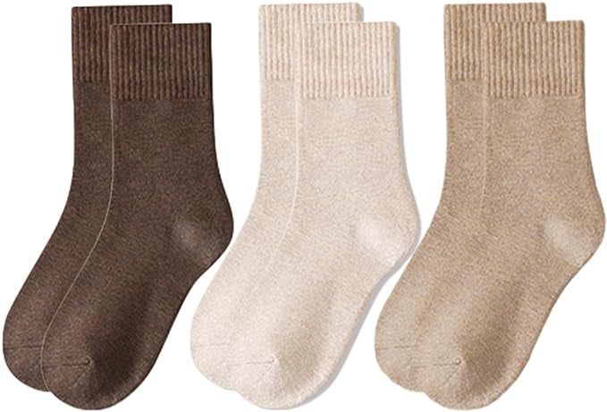 Three pairs of ribbed-top socks in dark brown, beige, and light brown, versatile for both casual and formal occasions, arranged side by side for a shopping feature.