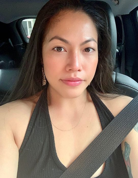 reviewer's car selfie wearing the skin tint