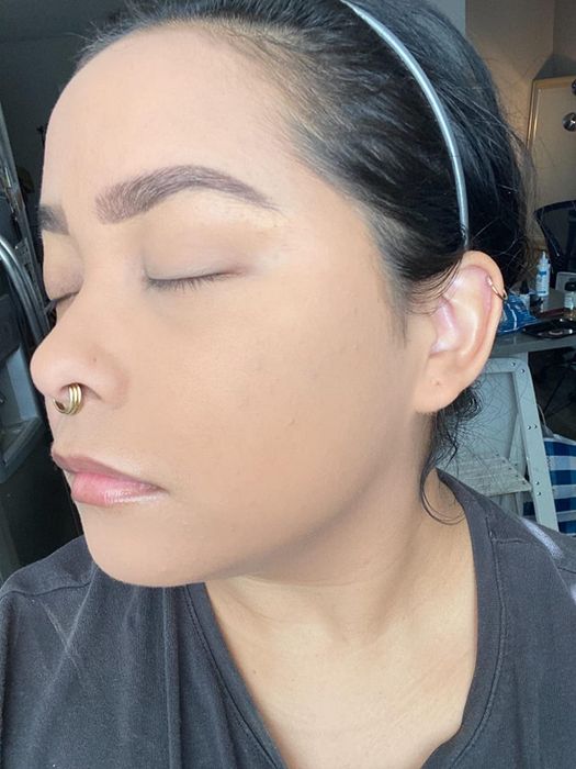A photo of the reviewer’s face after applying the powder foundation, showcasing a smooth and flawless finish.