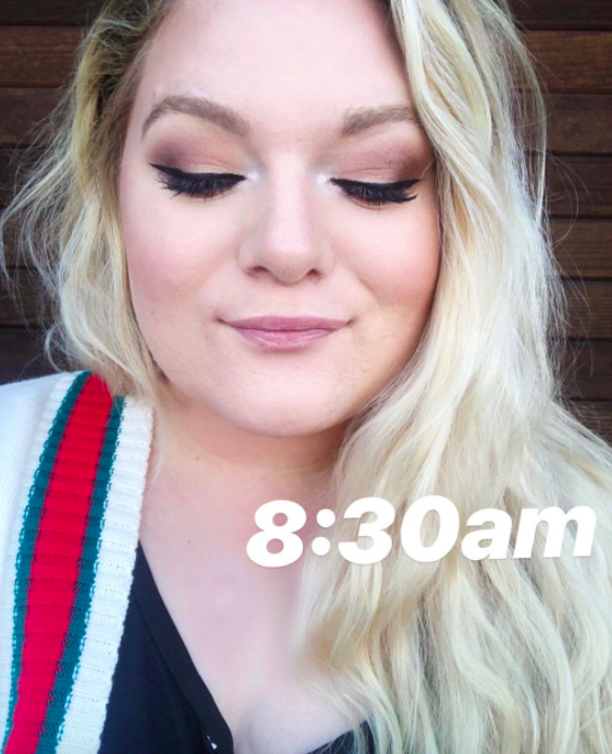 A customer's eye makeup captured in a review photo at 8:30 a.m.