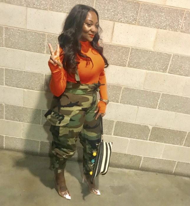 A customer review photo of them in the orange bodysuit and green pants.