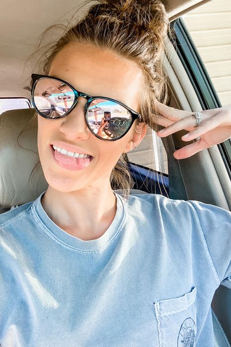 A reviewer modeling the sunglasses