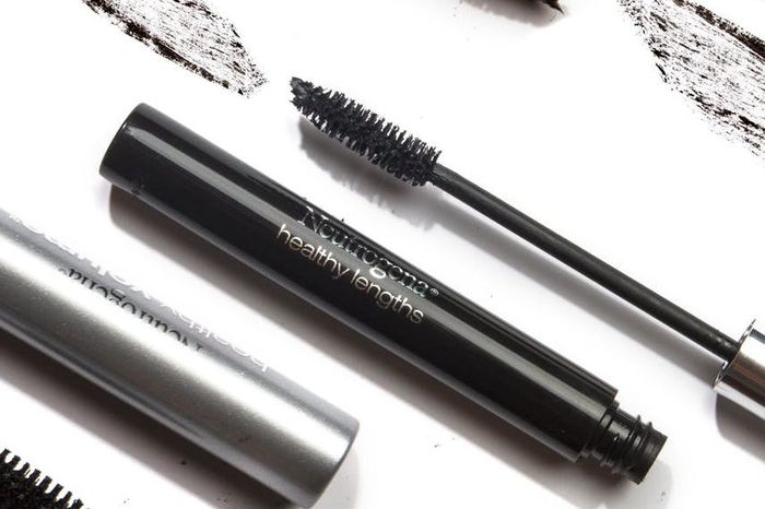 A close-up image of the mascara against a white background, highlighting its sleek packaging and features.