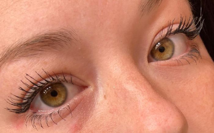 A reviewer showcasing the mascara.