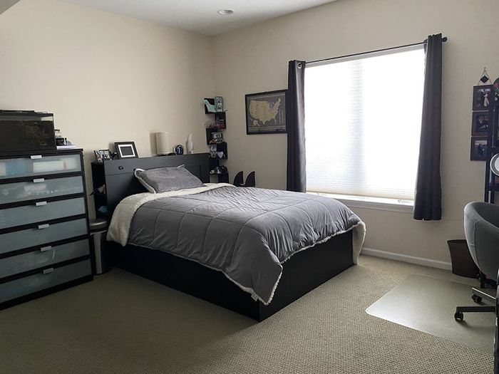 A reviewer's bright room with the curtains wide open, letting in the daylight.