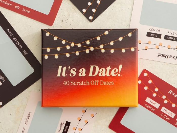 box with cards spread out around it