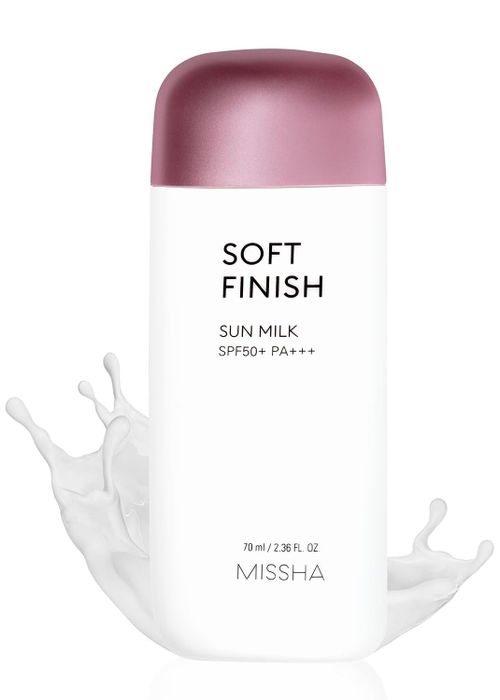 A bottle of MISSHA sunblock with a splash effect, labeled accordingly.