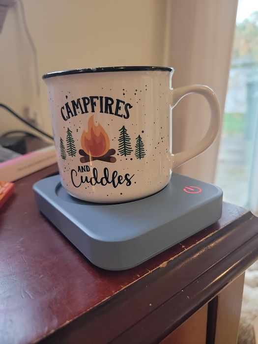 mug placed on a blue mug warmer
