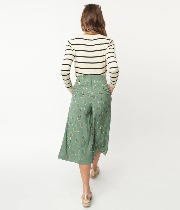 back view of model wearing green culottes