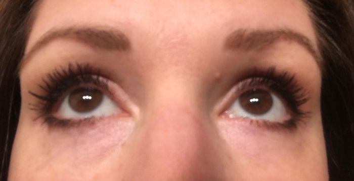 The reviewer showcasing the mascara applied to their lashes