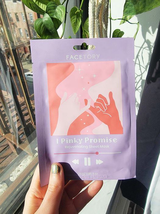 The editor showcases the lavender and orange sheet mask pack, which features a design that resembles a song being played on a phone.