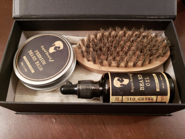 Reviewer image of the beard grooming kit inside its elegant gift box
