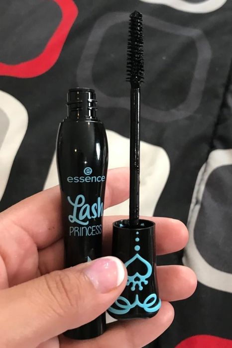 Customer holding the mascara