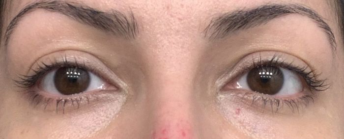A reviewer showcasing the mascara.