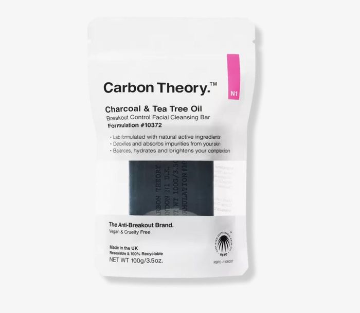 The cleansing bar packaging elegantly presented on display.