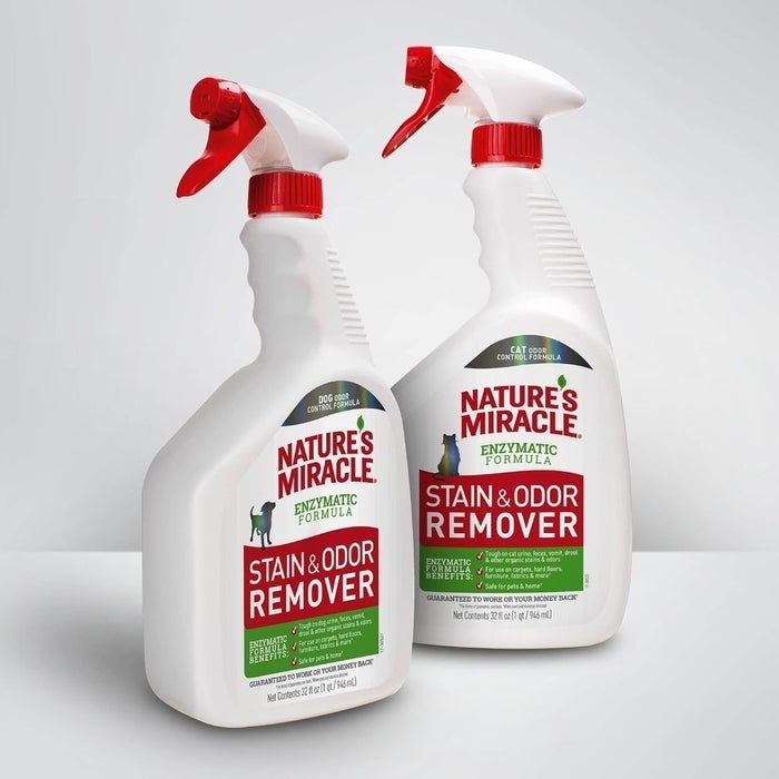 Two bottles of Nature's Miracle Stain & Odor Remover against a simple background