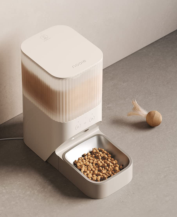 A detailed close-up of the modern automatic feeder