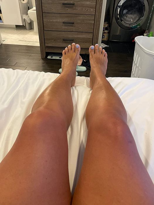 image of the reviewer’s glowing and sun-kissed legs