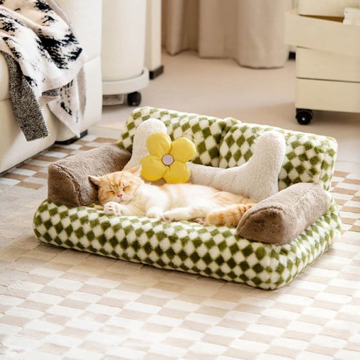 A compact green and white pet bed