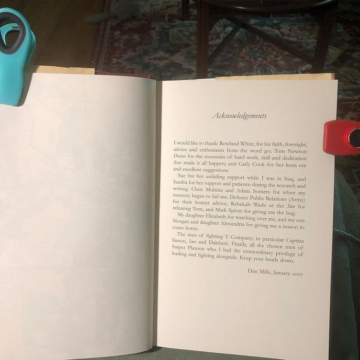 An open book with the Acknowledgements page held in place by blue and red clips, thanking various people who contributed to the author's journey in 2007.