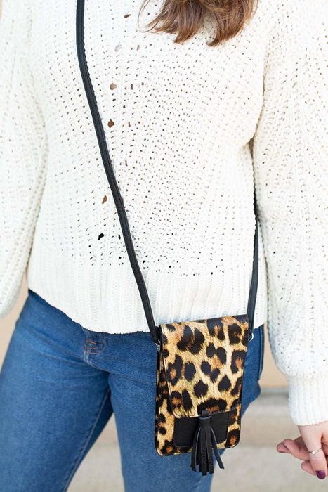The leopard print crossbody bag with a black tassel