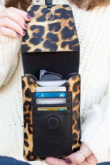 The purse opened to display the RFID-protected credit card slots