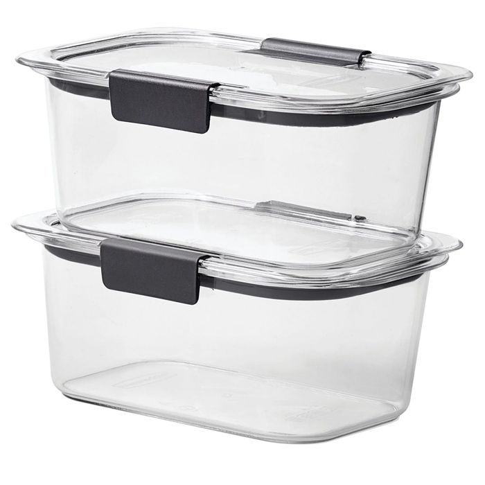 Two stackable, clear glass food storage containers, each featuring secure black locking lids.