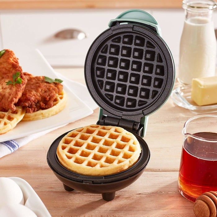 The mini waffle maker in a cheerful blue shade