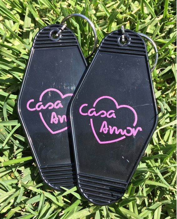 The rhombus-shaped keychain featuring 'Kellerman's mountain house Catskills NY' on one side and 'I carried a watermelon' on the other