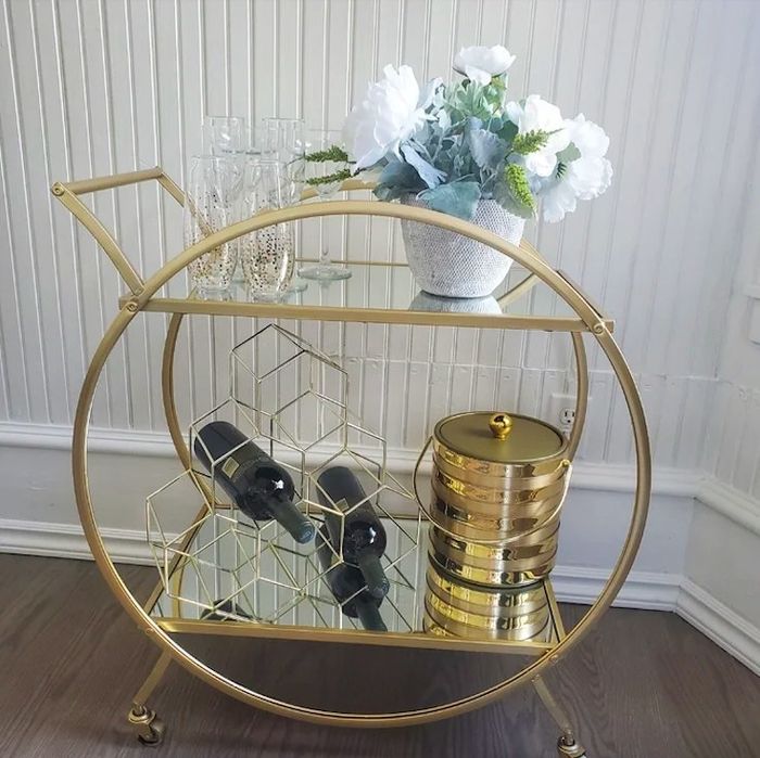 An image of a gold bar cart.