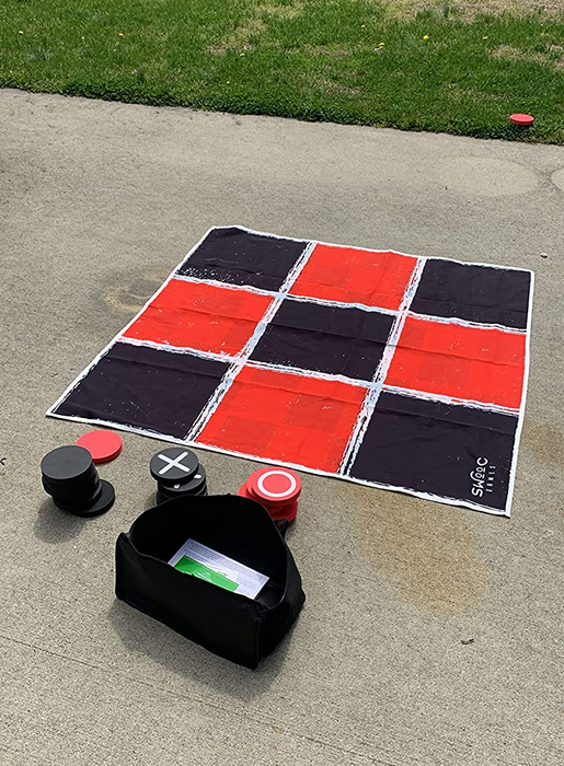 Another review photo showcasing the game mat in action with a game of tic-tac-toe.