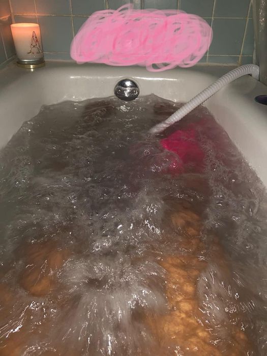 A photo of a tub with the mat activated, showcasing the bubbling jets in action.