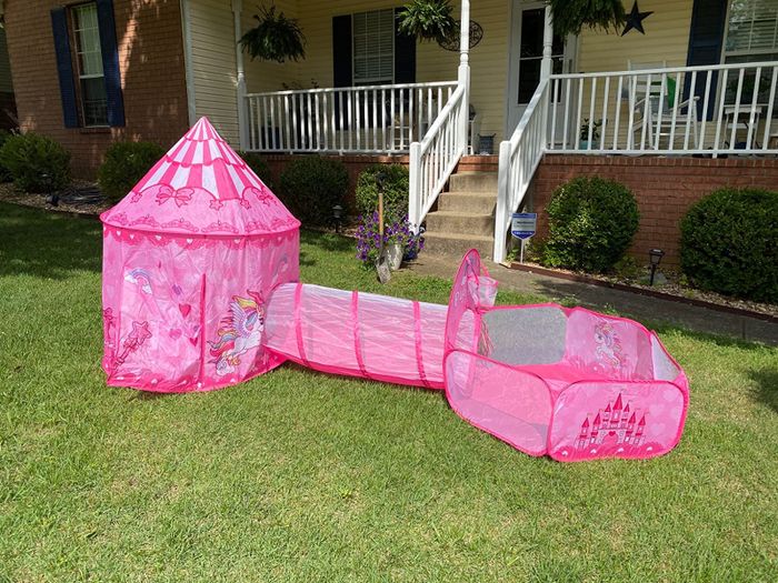 a reviewer's pink pop-up tent, tunnel, and ball pit set