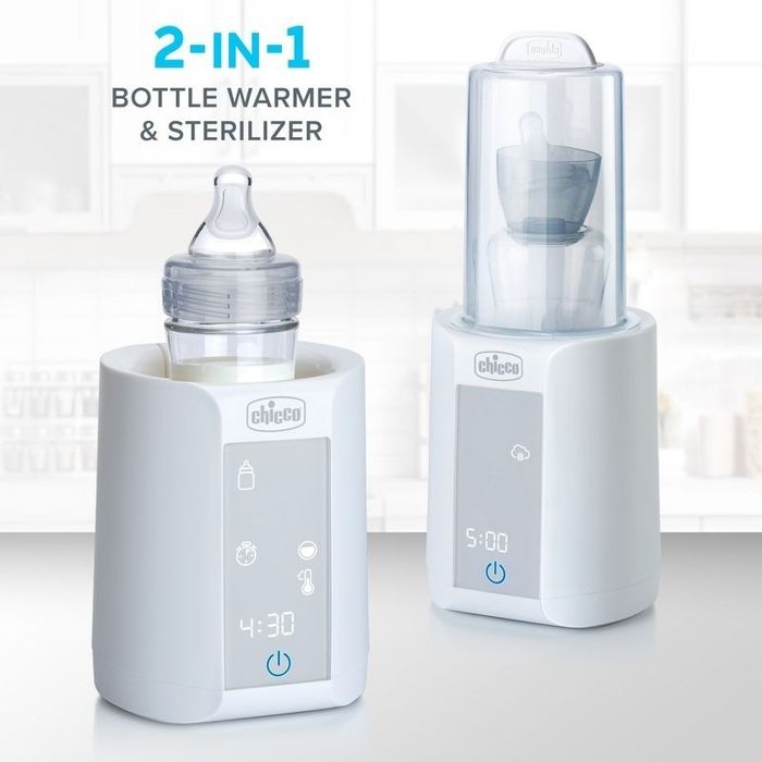 Two Chicco 2-in-1 bottle warmers and sterilizers, one warming a bottle and the other sterilizing a pacifier.