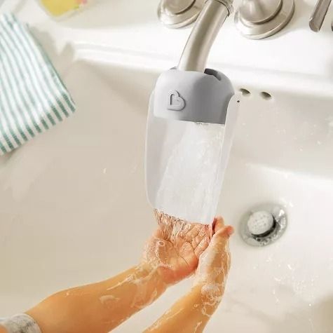 A faucet extender installed on a sink